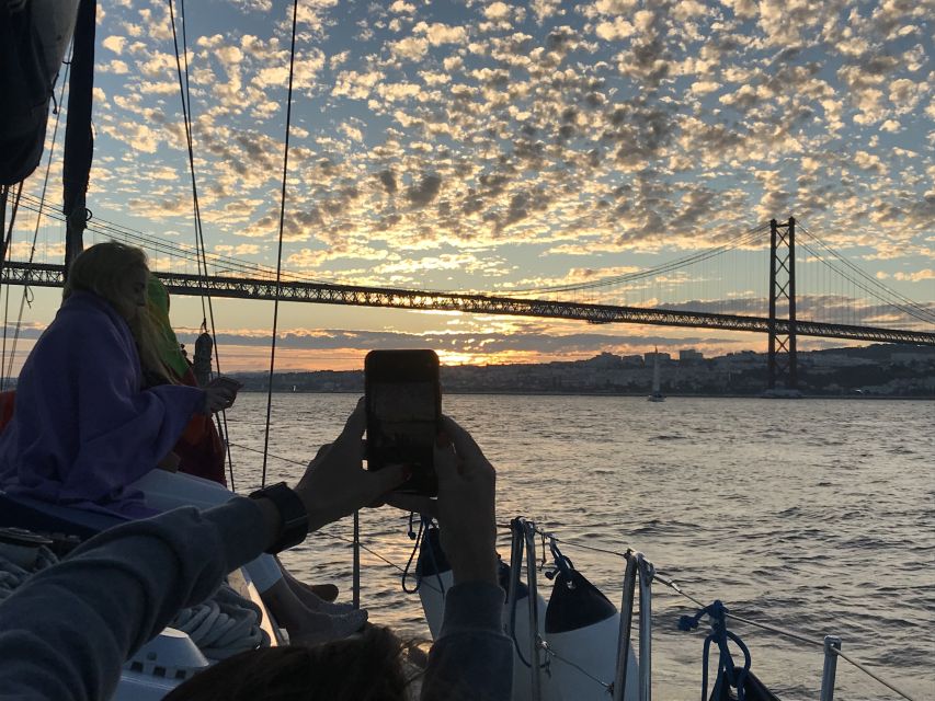 Lisbon: Sunset Sailing Cruise with Wine - Crew Energy and Sightseeing Tips Without the Lecture Tone