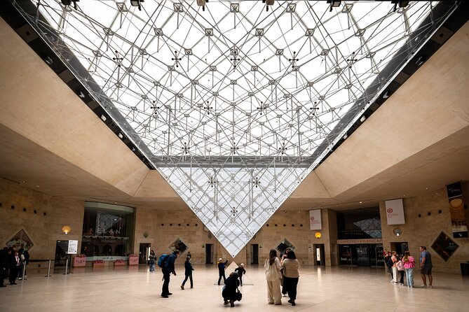Louvre Masterpieces Express Guided Tour & French Wine Tasting - Wine tasting at Ô Chateau: a polished finish, with real food