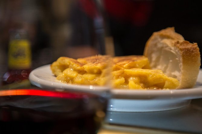 Madrid Local's Wine and Tapas Lunch Tour with a side of History - La Latina on foot: medieval streets with barrio stories