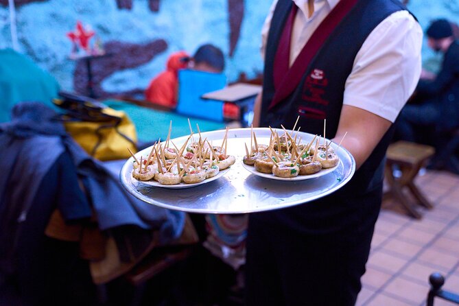 Madrid: Not Just Another Tapas & Wine Tour by Eating Europe - Calle Mayor, 84: Old Streets, Easy Momentum