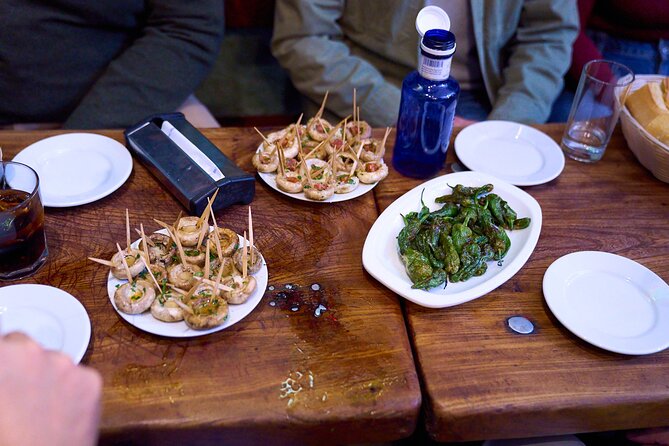 Madrid: Not Just Another Tapas & Wine Tour by Eating Europe - La Campana and La Trucha: The Calamari Surprise and the Big Bites