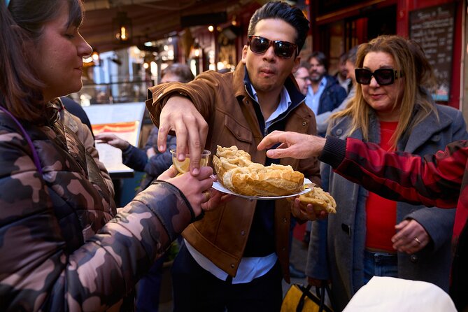 Madrid: Not Just Another Tapas & Wine Tour by Eating Europe - Plaza Mayor and Plaza de Ramales: The Walk Ends Where It Started