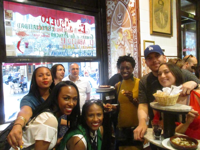 Madrid: Old Madrid Walking Food and Wine Tour - Meeting at Puerta del Sol: the Red Umbrella Start