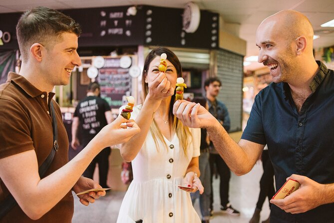Madrid Ultimate Spanish Cuisine Food Tour - Mercado de Antón Martín: olives, cured meats, olive oil, and when locals drink vermouth
