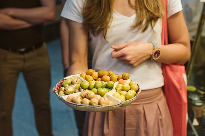 Madrid Ultimate Spanish Cuisine Food Tour - Bar La Campana: calamari sandwich culture and tapas pacing