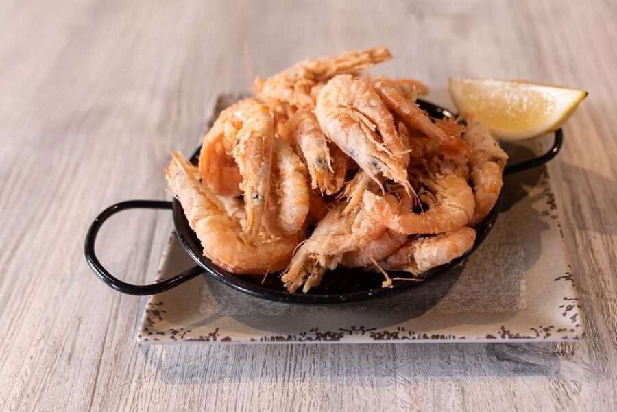 Malaga: PREMIUM TAPAS TOUR Paella, Tapas, Winery & Flamenco - Stop 2: Tapas and a drink in a traditional Malaga restaurant