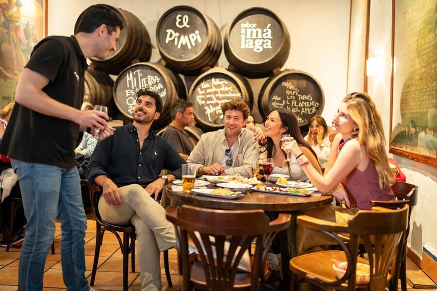 Málaga: Tapas, Wine & Rooftops Private Tour - Stop 1: An old-fashioned wine tavern start