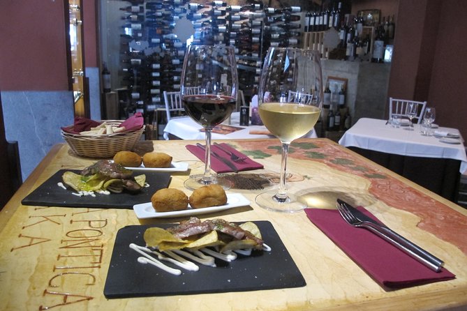 Malaga Wine & Tapas Small Group Guided Tour - The modern finale near Alcazaba: gazpachuelo and arroz con chistorras