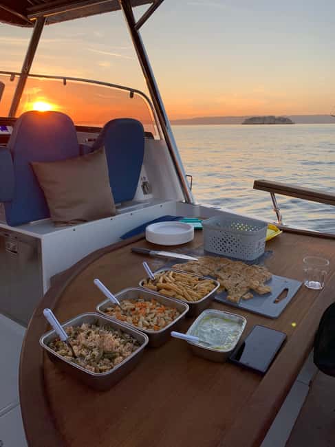Marseille: Sunset Boat Cruise with Buffet and Organic Wine - Frioul Archipelago Stop: Anchorage, Swim Time, and Photo Breaks