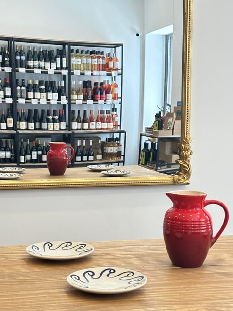 Marseille: Tailored Wine Tasting Experience in Top Wine Shop - Entering the cool, calm wine shop on Rue de la Tour