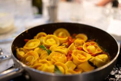 Milan: Pasta Class with Gelato or Tiramisù & Unlimited Wine - What you make: tagliatelle, stuffed ravioli, and the sauce game