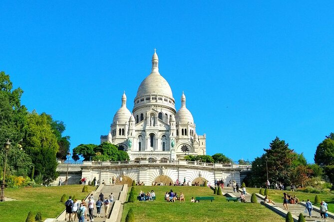 Montmartre Hill French Gourmet Food and Wine Tasting Walking Tour - Wall of Love and Place du Tertre: the art-poster sights, but useful