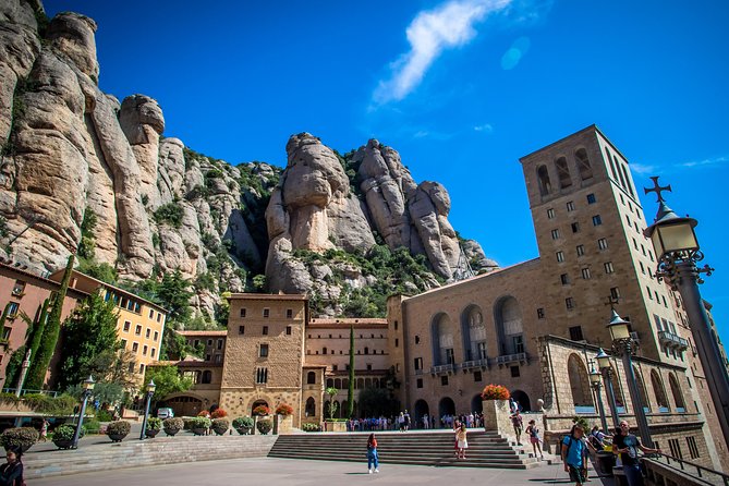 Montserrat & Winery Visit Tour with Traditional Farmhouse Lunch - Montserrat Abadia: the Royal Basilica, Black Virgin, and big mountain air