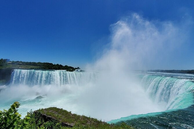 Niagara Falls Day Tour Includes Boat Cruise, Winery Stop & Lunch - Boat Cruise on Niagara City Cruises (Summer) or Journey Behind the Falls (Winter)