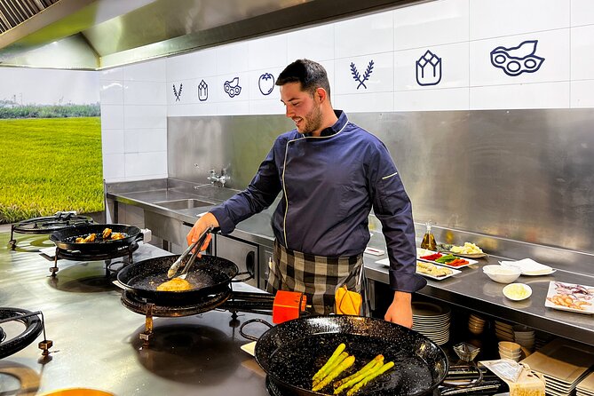 Paella Cooking Class, Wine Tasting & Central Market in Valencia - The cooking lesson: step-by-step paella, not a black-box demo