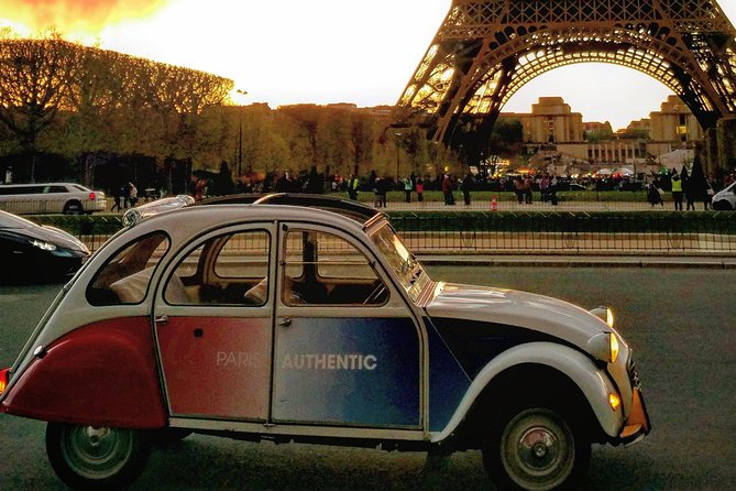 Paris and Montmartre 2CV Tour by Night with Champagne - Notre-Dame and Louvre Stops: Great Views, No Admission Included