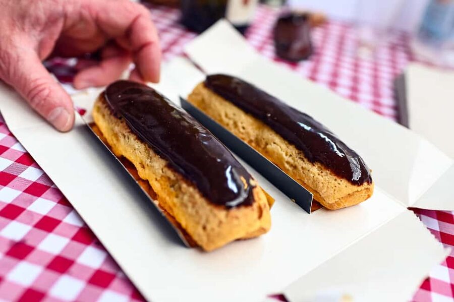 Paris: Le Marais District Food Tour with 10+ Tastings & Wine - Bakery breads and cheese stops: what makes the tasting feel French