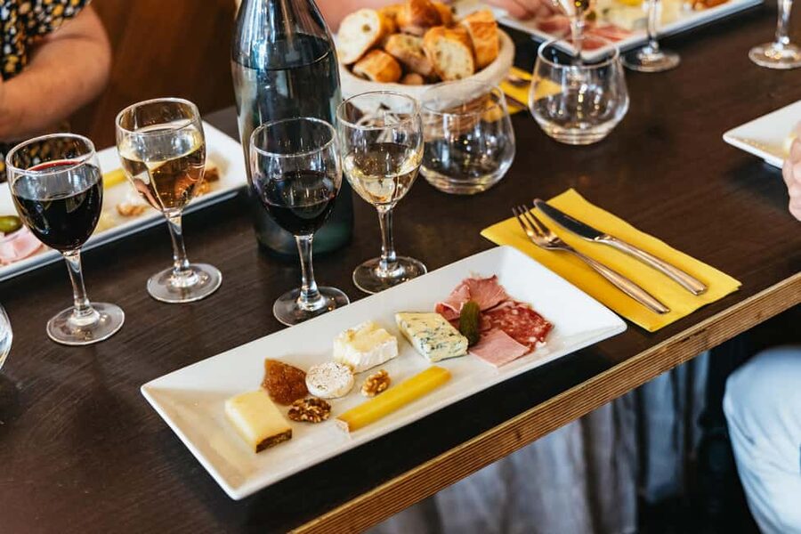 Paris: Montmartre Cheese, Wine & Pastry Guided Walking Tour - Moulin Rouge to Place du Tertre: Classic Montmartre, With Food Doing the Storytelling