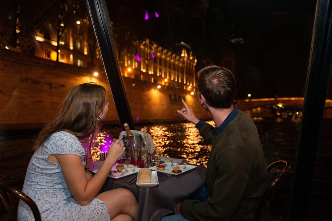 Paris Seine River Dinner Cruise with Champagne and Window Seating - On-board vibe: Champagne, flowers, and how service typically feels