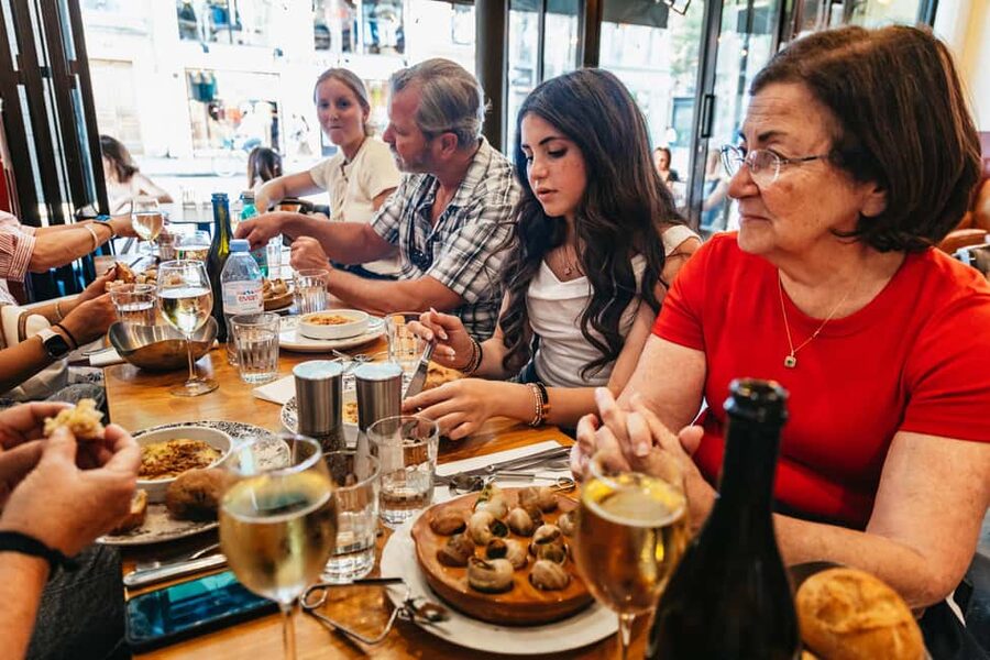 Paris: Walking Food Tour with Cheese, Wine and Delicacies - The market stop: fresh food energy, not tourist-only souvenirs