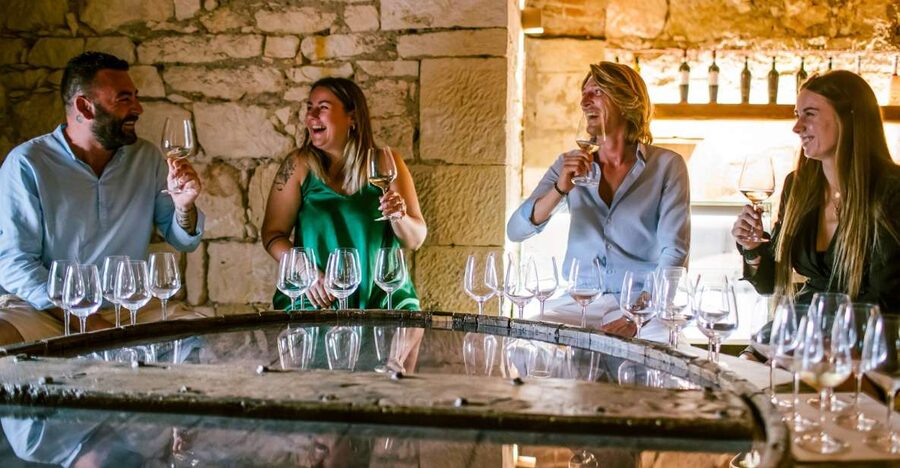Pastrengo: Lake Garda Wine & Food Tasting in Historic Fort - Entering the Pastrengo fort with the golden eagle gate