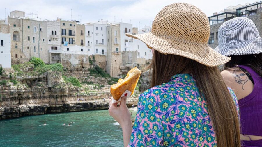 Polignano a Mare: Street Food Tour with Tastings and Wine - Stories behind the streets: film locations and guides who make the town click