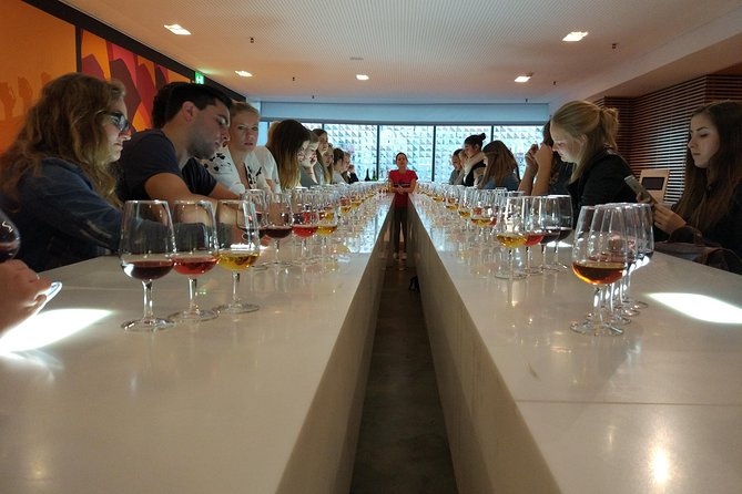 Port Wine Lodges Tour Including 7 Port Wine Tastings (English) - Interactive cellar and visitor centers: barrels, cork, and Douro Valley basics
