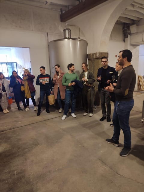 Porto: Port and Douro Wine Walking Tour with 9 Tastings - Entering the Gaia Wine District: Where Your Tour Starts