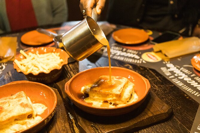 Porto Wine & Dine: Port Wine Cave Food Tour with Eating Europe - Real Companhia Velha cellar tour: tasting port where the story started