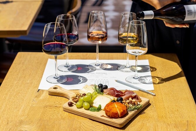 Porto Wine Tasting Experience with Portuguese Tapas Plate - Your wine flight: Douro whites, rosé, reds, and White Port