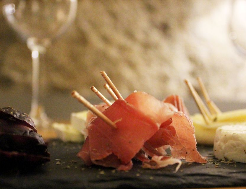 Porto: Wine Tasting with Tapas Walking Tour - Lunch stop: Portuguese tapas, codfish cakes, cheese-style bites, and pairing logic