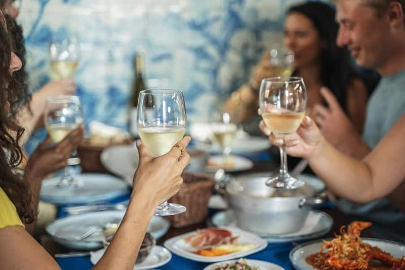 Private Lisbon Food Tour in Baixa with Wine & Local Delights - Rua da Madalena and Igreja de São Domingos: petiscos, seafood, and meaning