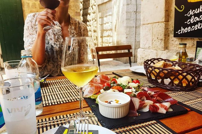 Private Walking tour with Wine and Food - Sea Gate start: getting your bearings fast