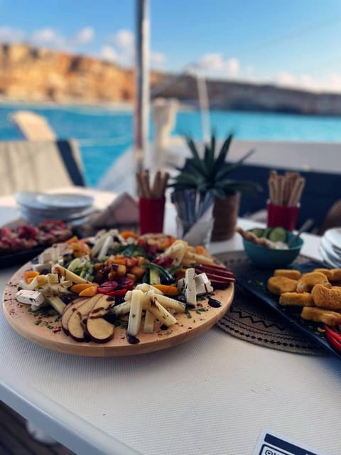 Rethymno: Sunset Catamaran Cruise - Sushi & Open Bar - Skaleta swim time: snorkeling, SUP, noodles, and the flamingo float