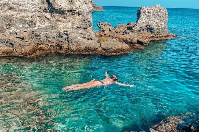 Rhodes Bay to Bay Swim Cruise-Greek Buffet w/wine included - Leaving Mandraki Old Port: Rhodes Medieval Walls in your first photos