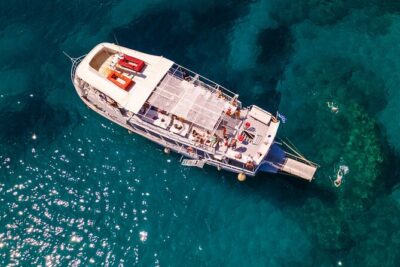 Rhodes Bay to Bay Swim Cruise-Greek Buffet w/wine included - The Colossus of Rhodes sightline: where the legend meets the sea