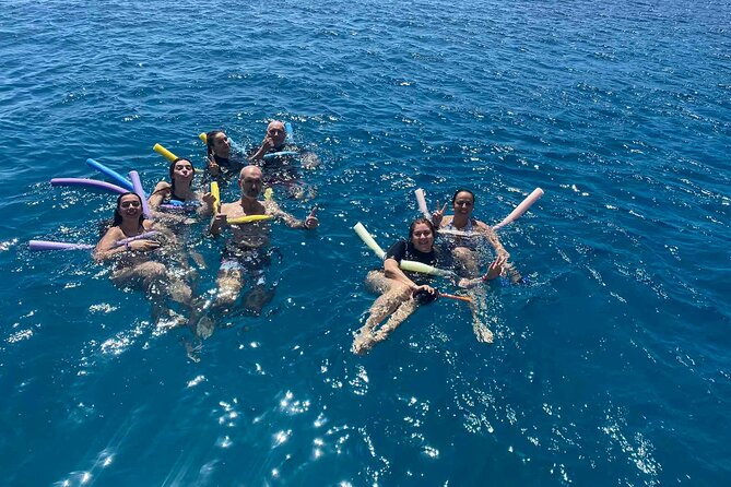 Rhodes Bay to Bay Swim Cruise-Greek Buffet w/wine included - Cruising comfort: shaded decks, cushioned seating, and a shower that counts