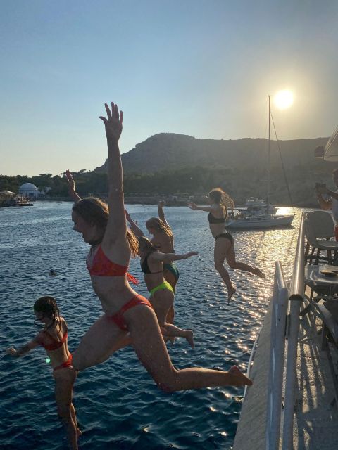 Rhodes: Bay to Bay Swim Cruise with Greek Buffet and Wine - East Coast views from the boat: landmarks as you head south