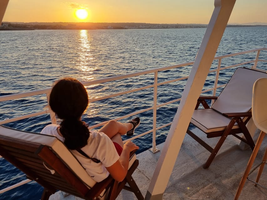 Rhodes: Sunset Cruise with Live Music, Wine & Greek Buffet - Logistics that matter: meeting point and what to pack