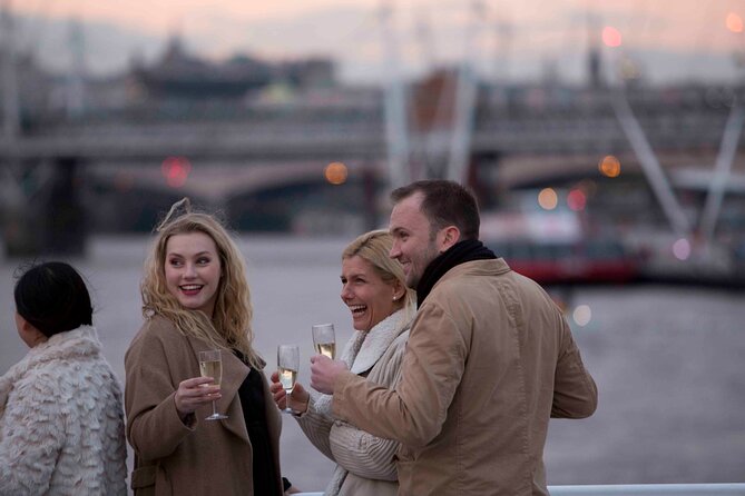River Thames Evening Cruise with Sparkling wine and Canapés - Live music on board: a fun add-on, not a guaranteed lecture