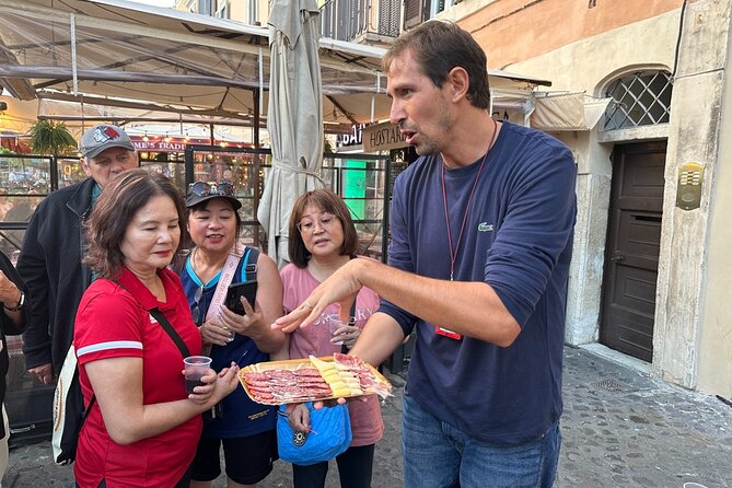Rome Food Tour: Hidden Gems of Trastevere with Dinner & Wine - Stop 3: a three-course Roman dinner with wine pairing and limoncello