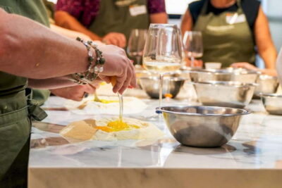 Rome: Hands-On Pasta & Tiramisu Class with Unlimited Wine - Getting to the Kitchen and Settling In Fast