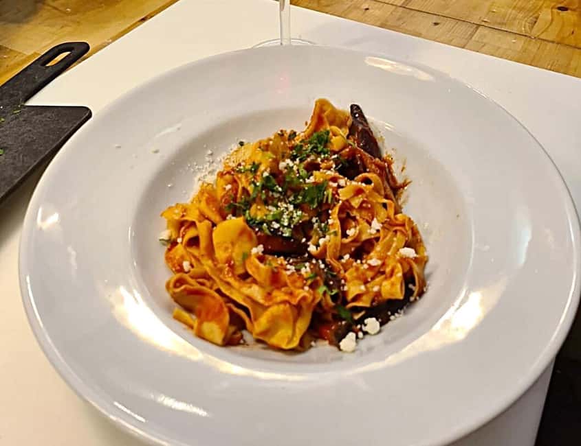 Rome: Pasta Cooking Class with Market Visit and Wine - Sauce and wine time: learning flavor while you eat