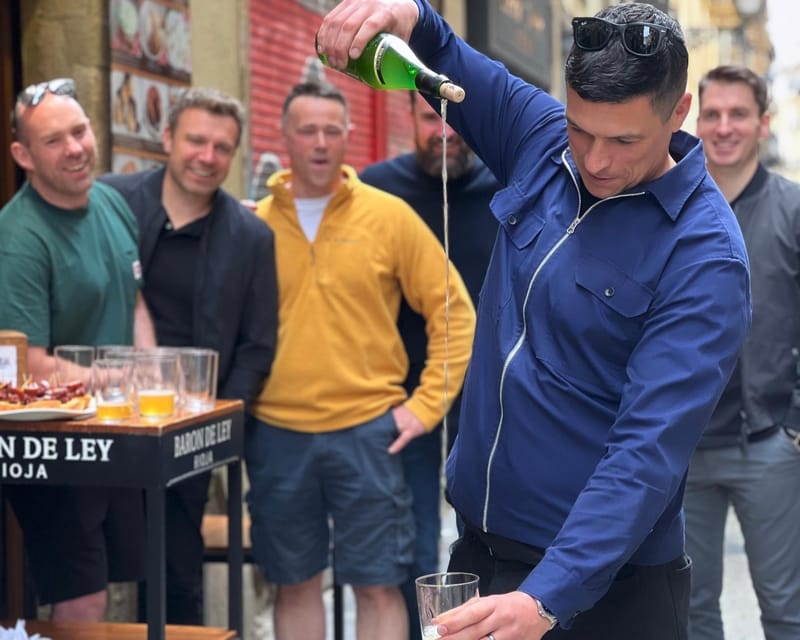San Sebastian: Market, Pintxos and Wine Tasting Tour - Old Town bar hopping: how pintxos work in real life