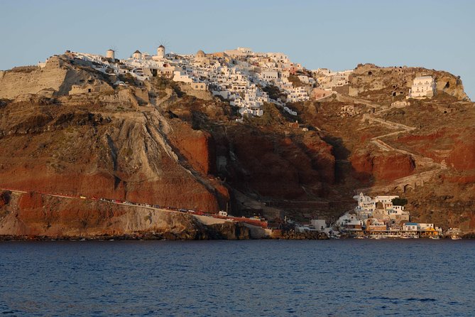 Santorini Caldera Sunset Sailing Cruise with Dinner and Wine - Stop 2: Palea Kameni hot springs swim (and why noodles help)