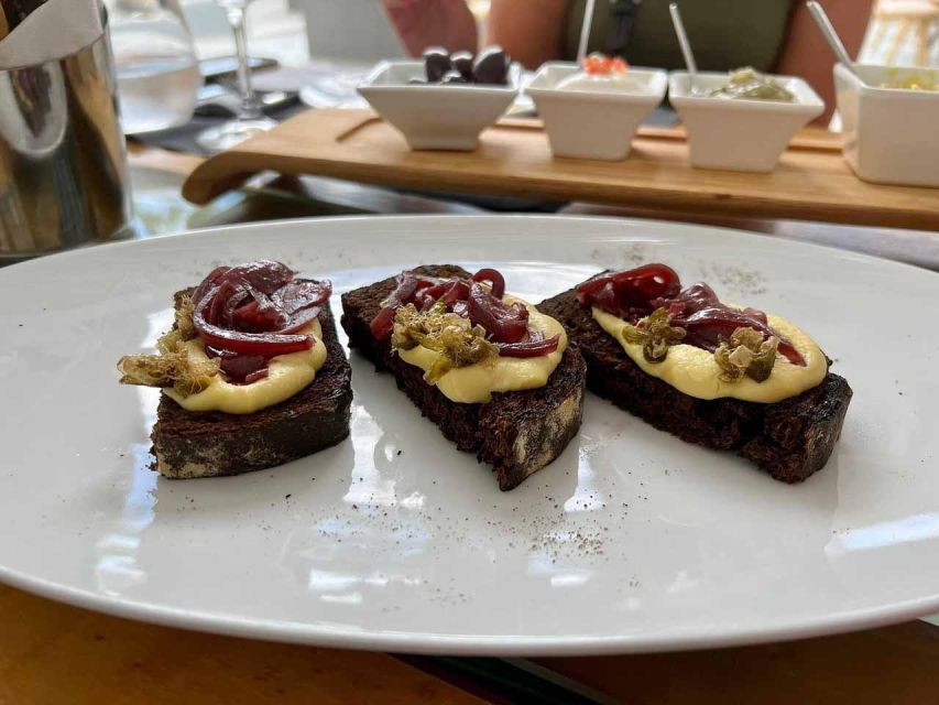 Santorini: Small-Group Sunset Wine Tour with Santo Winery - Cellar time and how the tour turns tasting into understanding