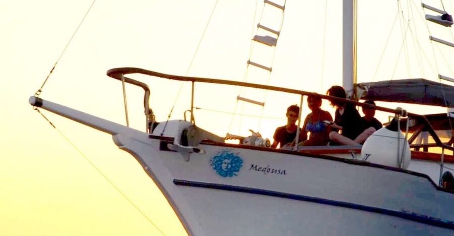 Santorini: Traditional Wooden Boat Tour with Meal and Wine - Volcanic Hot Springs: The Geothermal Swim That Changes Your Day