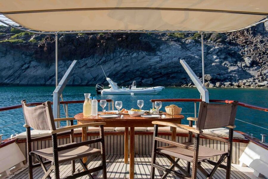 Santorini: Traditional Wooden Boat Tour with Meal and Wine - Thirassia Island: Fishermen’s Coast and Another Snorkeling Chance