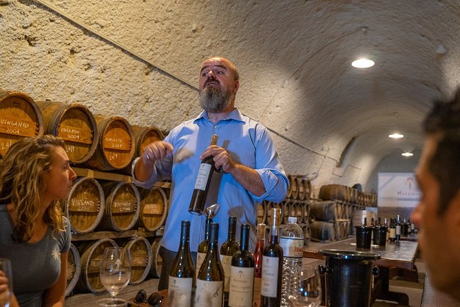 Santorini Wine Roads Tour with Wine Tastings Morning & Sunset - Three winery stops and snack pairings: what the 4-hour rhythm feels like