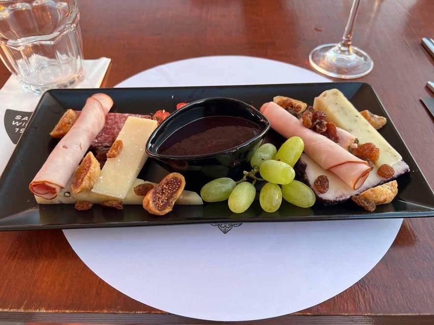 Santorini: Wine Tasting Tour with Snacks - Stop 3: Santo Winery for Waterfront Views and Sunset Magic